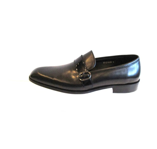 "Black Elegance: Slip-On Shoe with Patent Strap Deta