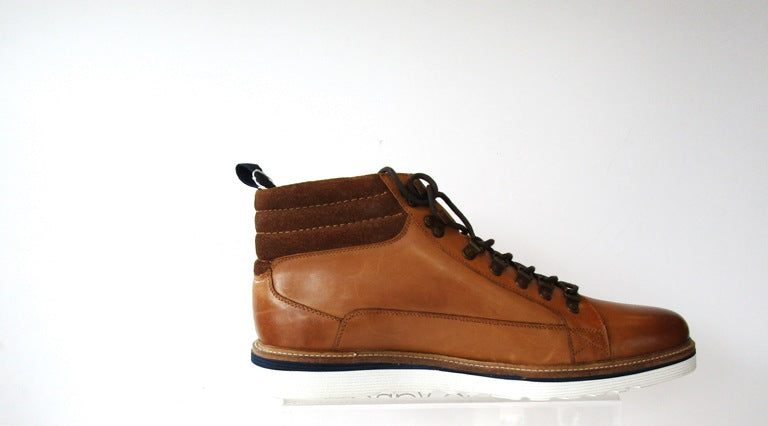 Mountain-Inspired Design — Rugged alpine style with sturdy lace hooks and reinforced stitching