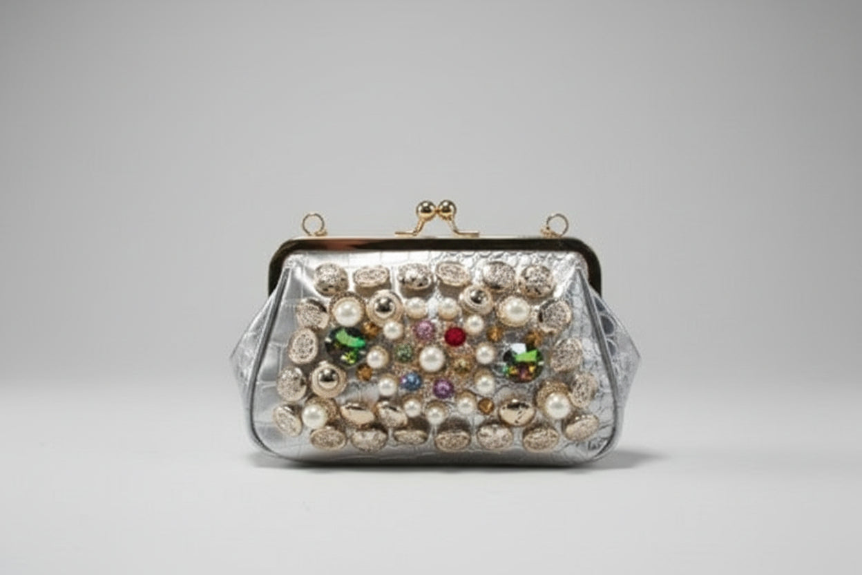 gemstones and pearls on a reflective back round