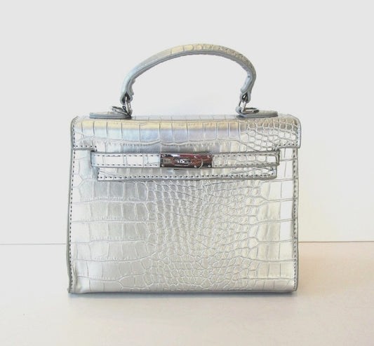 Sleek & Stylish: Silver Mini Handbag with Unique Design & Versatile Straps