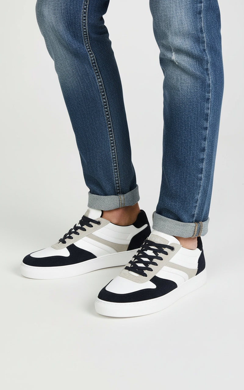 white and navy trainers 