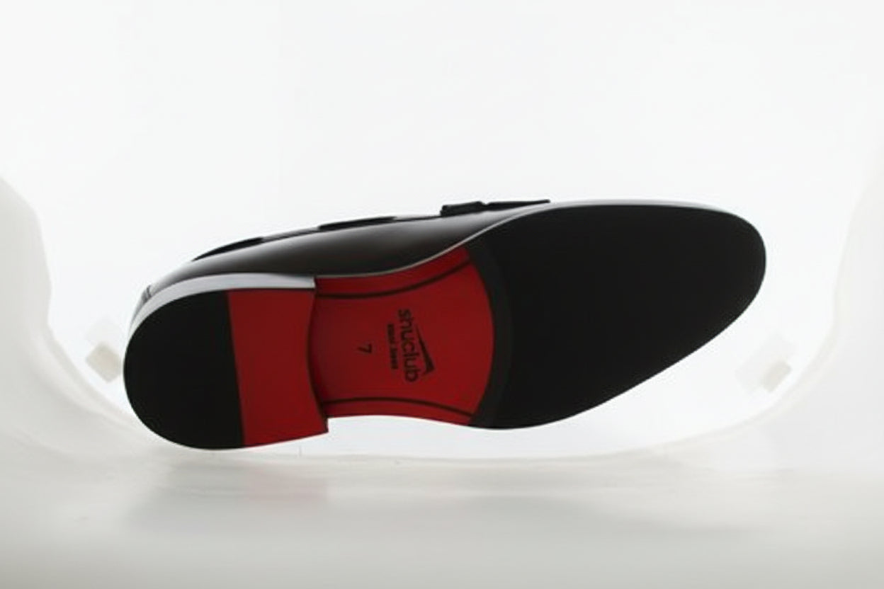 man made red and black sole 