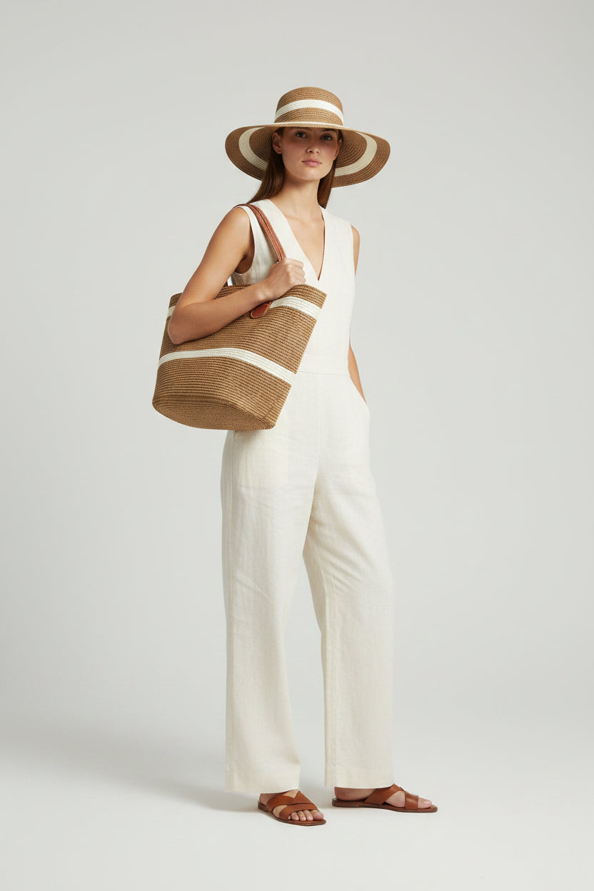 Brown and beige striped hat and bag on a white background